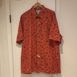 Duluth Men's Cotton Casual Short Sleeve Shirt in Burnt Orange and Black print.
